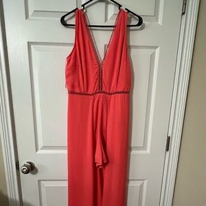 Boutique high-low romper in coral pink. Size 4.
